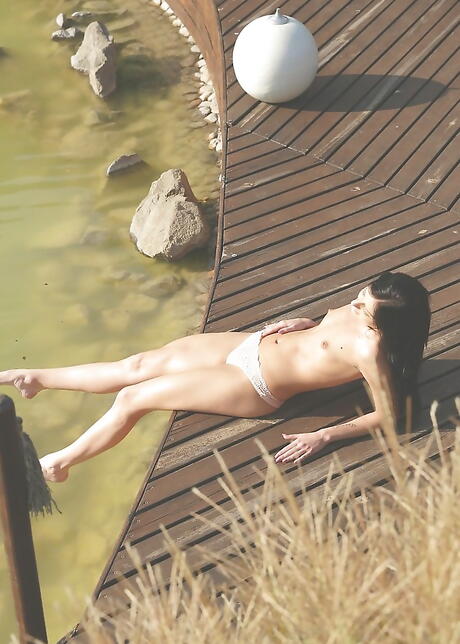 Excellent hungarian pornstar Daniella Rose in hot panties in foot fetish show near the pool