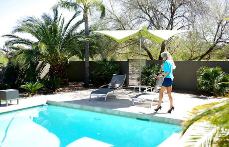 Stunning american wife Sandra Otterson exhibiting big boobs and taking off her clothes at pool