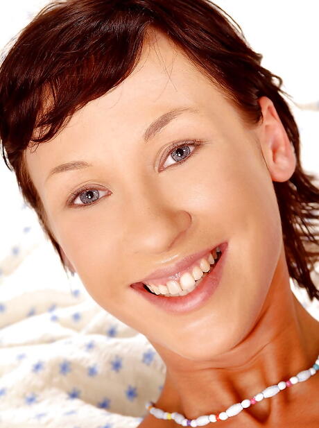 Luscious red-haired youthful Alex reveals tiny tits and toys her snatch 