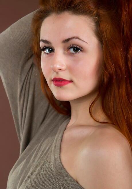 Gracile red-haired teen Sascha A showing big hooters and hairy pussy 