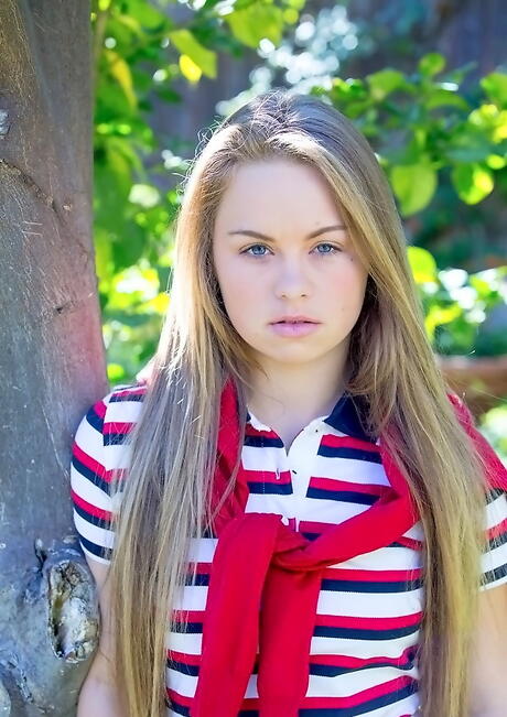 Luscious american young Madison Chandler denudes big knockers and hot butt outdoor