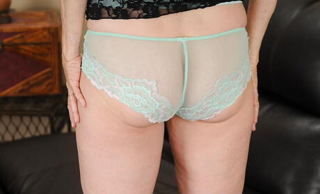 Sexy american blonde mature Annabelle Brady in hot panties revealing her butt and masturbating 