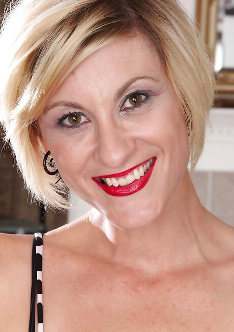 Curious blonde mature Jayden Monroe in sexy undies showing small tits and bald pussy 