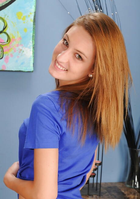 Foxy american red-haired teen Maci Winslett bares her butt 