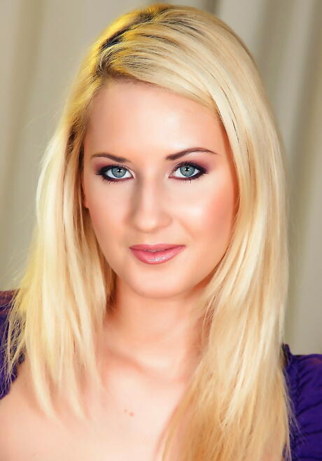 Sylphlike blond young Blond Cat in sexy skirt reveals her ass and masturbates 