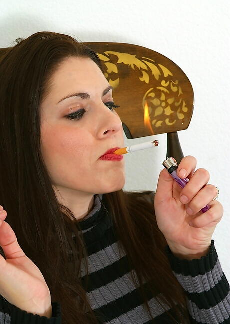 Very attractive milf Dahlia in hot pantyhose enjoys smoking 