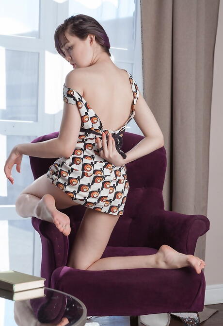 Excellent brunette youthful Uliana unveiling tiny tits and spreading her legs 