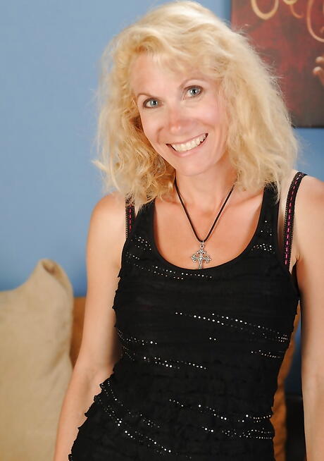 Excellent blond mature Shay Nollen in sexy underwear uncovering tiny tits and spreading her legs 