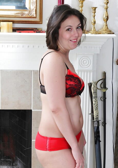 Adorable milf Penny Prite in sexy undies denudes small tits and spreads her legs 