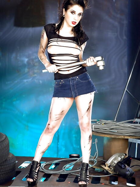 Appealing american brunette milf Joanna Angel in sexy shorts showing big hooters and ass 