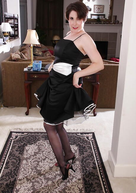 Inviting milf Sadie Jones in fancy skirt exposing big tits and spreading her legs 