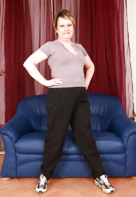 Deluxe older Carmen T exposing big hooters and cute pussy 