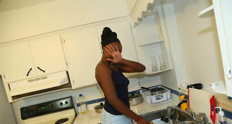 Tempting black milf Naomi Gamble in skirt denudes big boobs and hot butt 