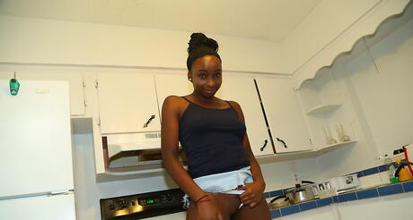 Tempting black milf Naomi Gamble in skirt denudes big boobs and hot butt 