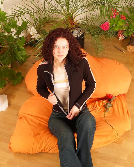 Very attractive young Andrea uncovering small tits and masturbating 