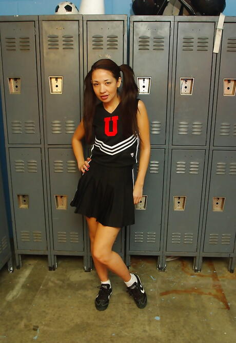 Attractive oriental milf Coco Velvet shows her ass 