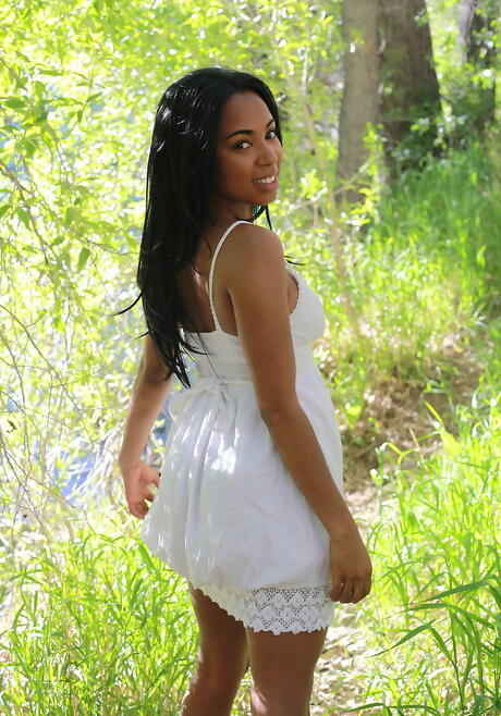 Hot babe Tahela in sexy skirt loves foot fetish outdoor