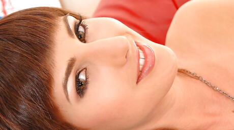 Slim dark hair teen Katty Heart in sexy pantyhose exhibits her ass and pussy 