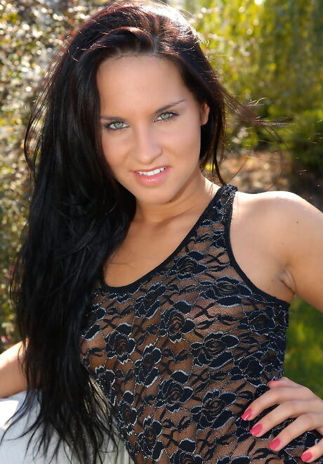 Svelte hungarian brunette young Bettina Dicapri shows tiny tits and spreads her legs outdoor