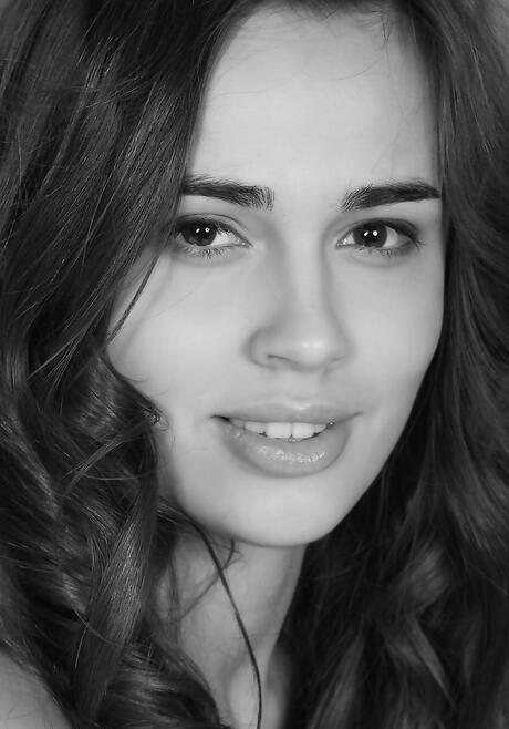 Hot teen Trista A in fancy skirt bares small tits and bald pussy outside