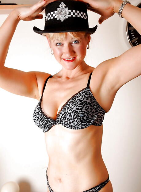 Sexy american mature Suzy exposes her butt in uniform outfit and toying her snatch 