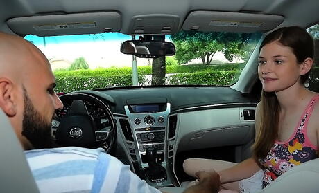 Slim american teen Lara Brookes blows on big cock in vehicle