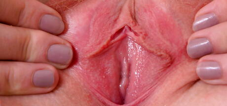 Stunning blond babe Bambi showing big tits and spreading her legs 