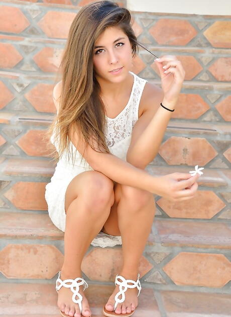 Slender american brunette young Natalie Monroe shows her ass in and dildoing outside