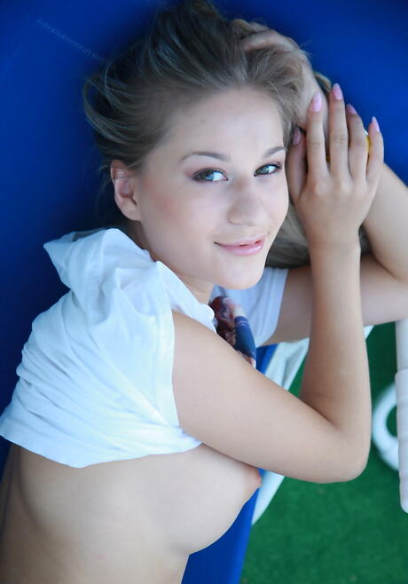 Hot blonde teen Candice B denudes big boobies and spreads her legs outdoor