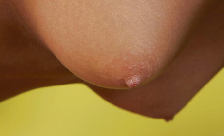 Lovely milf Sasha Kurt exhibiting big knockers and bald pussy 