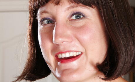 Stunning brunette mature Meredith Johnson shows small tits and masturbates 