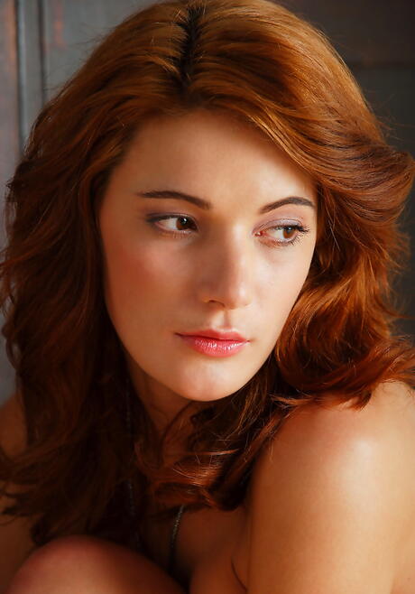 Very attractive russian red-haired young Milla Yul shows big boobies and bald pussy 