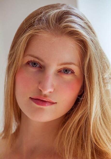 Gracile blonde young Bretona in jeans exposing tiny tits and spreading her legs 