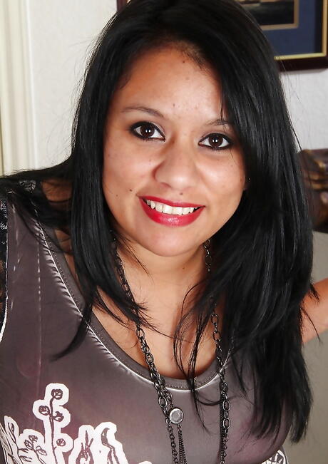 Peachy latina milf Lucey Perez showing big tits and hot butt 