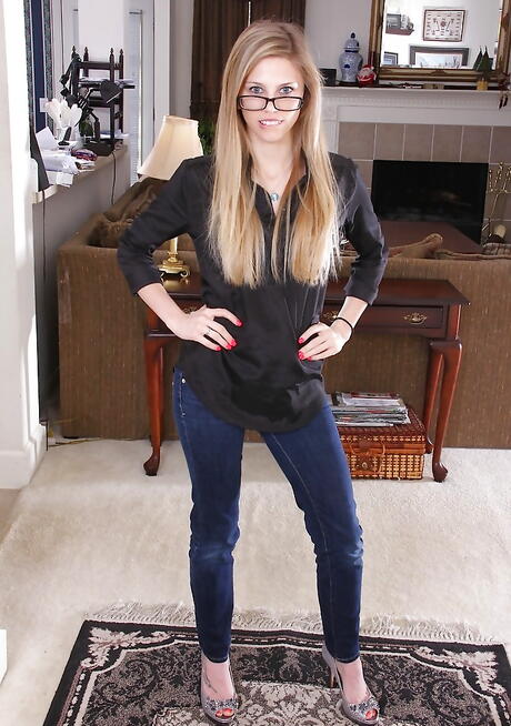 Slim american youthful Kassie Kensington in tight jeans showing small tits and spreading her legs 