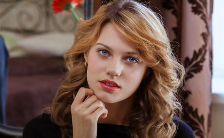 Gracile blonde teen Shirley Tate uncovers tiny tits and shaved pussy 