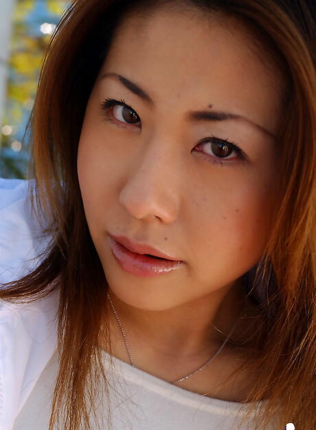 Peachy japanese babe Sumire reveals big titties and hairy pussy 