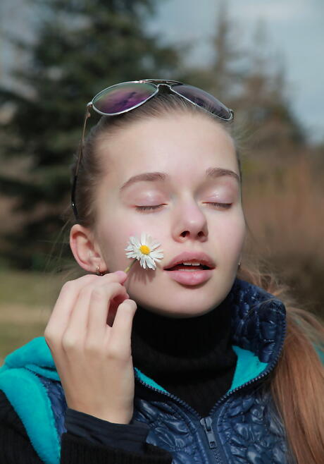 Shapely youthful Milena D uncovering tiny tits and hairy twat outdoor