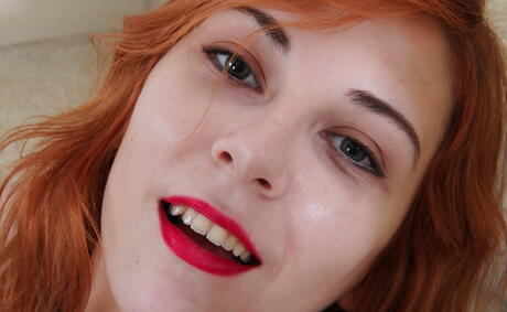 Excellent american redhead youthful Nancy Reid in undies exhibits her ass and shaved pussy 