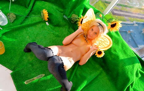 Appealing blond hottie Maya F reveals big knockers and plays with toy 