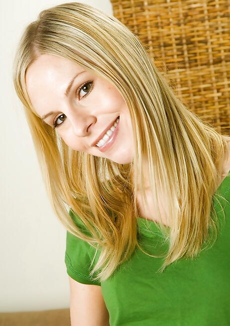 Hot blond youthful Brenna Bentley in nice skirt denudes and reveals small tits 