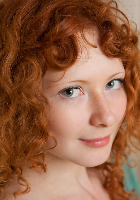 Sylphlike redhead teen Rochelle A uncovering tiny tits and hairy pussy 