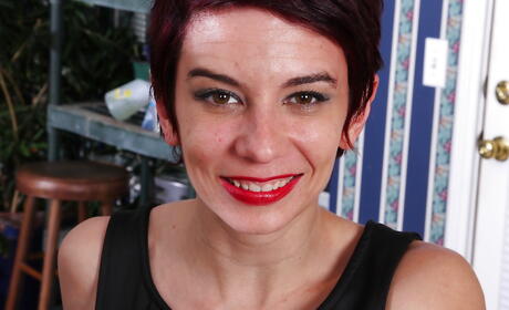 Curious mature Nikki Lee in sexy undies showing small tits and spreading her legs 