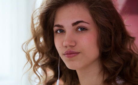 Shapely dark hair teen Jasmina unveils tiny tits and bald pussy 