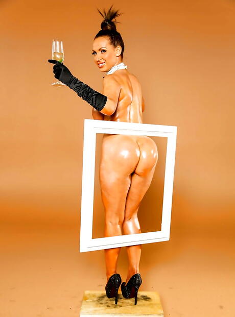 Delightful canadian milf Nikki Benz bares big boobies and hot ass 