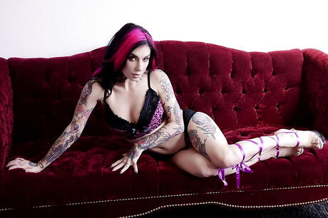 Deluxe american redheaded milf Joanna Angel exposes her ass in sexy undies and spreading her legs 