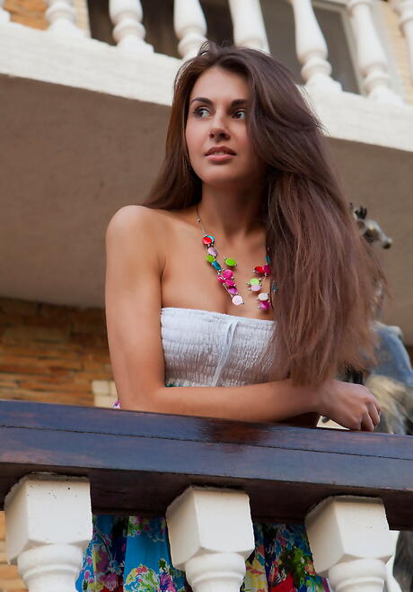 Hot milf Astrud A in skirt exhibits small tits and spreads her legs 