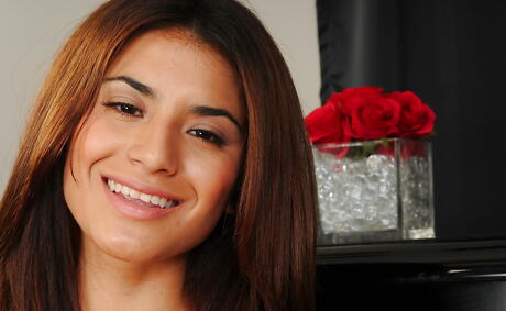 Svelte latin youthful Ava Mendes exposes her ass in sexy skirt and spreading her legs 