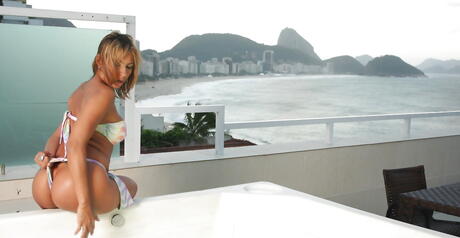 Inviting brazilian milf Suzy Anderson revealing big titties and butt in bath