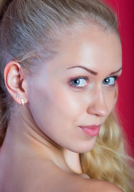 Excellent blonde teen Kaylee A denudes big titties and bald pussy 